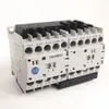 Rockwell Automation / Allen-Bradley 104-K12ZQ02 – IEC Miniature Reversing Contactor — photo 1 of 2 Rockwell Automation / Allen-Bradley 104-K12ZQ02 – IEC Miniature Reversing Contactor — photo 1 of 2